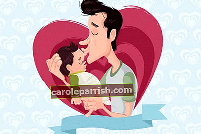 humoristiskt fars dagskort som visar en pappa som kysser sin lilla